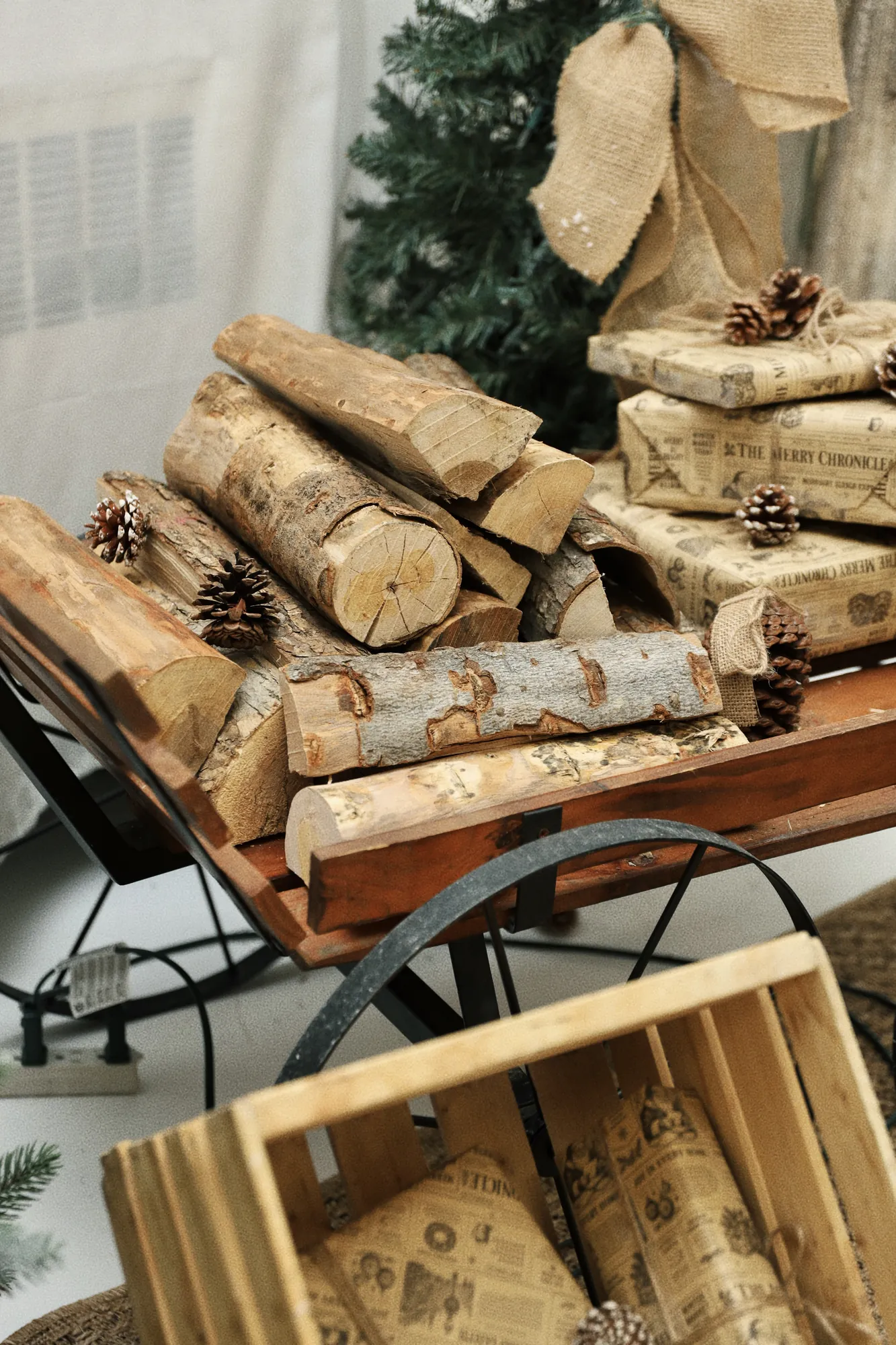 Evergreen Lodge Christmas set, Saloon studio, Maison Tela Montreal – logs and sled